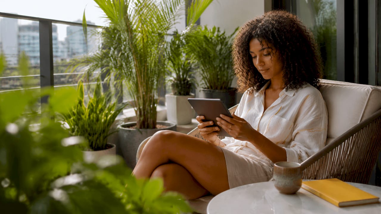 Woman browsing Limited Brands website at home