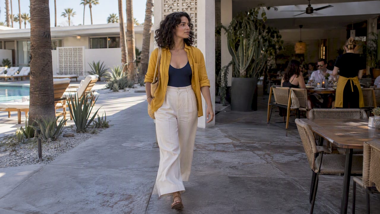 Woman layers swimwear for Palm Springs dinner